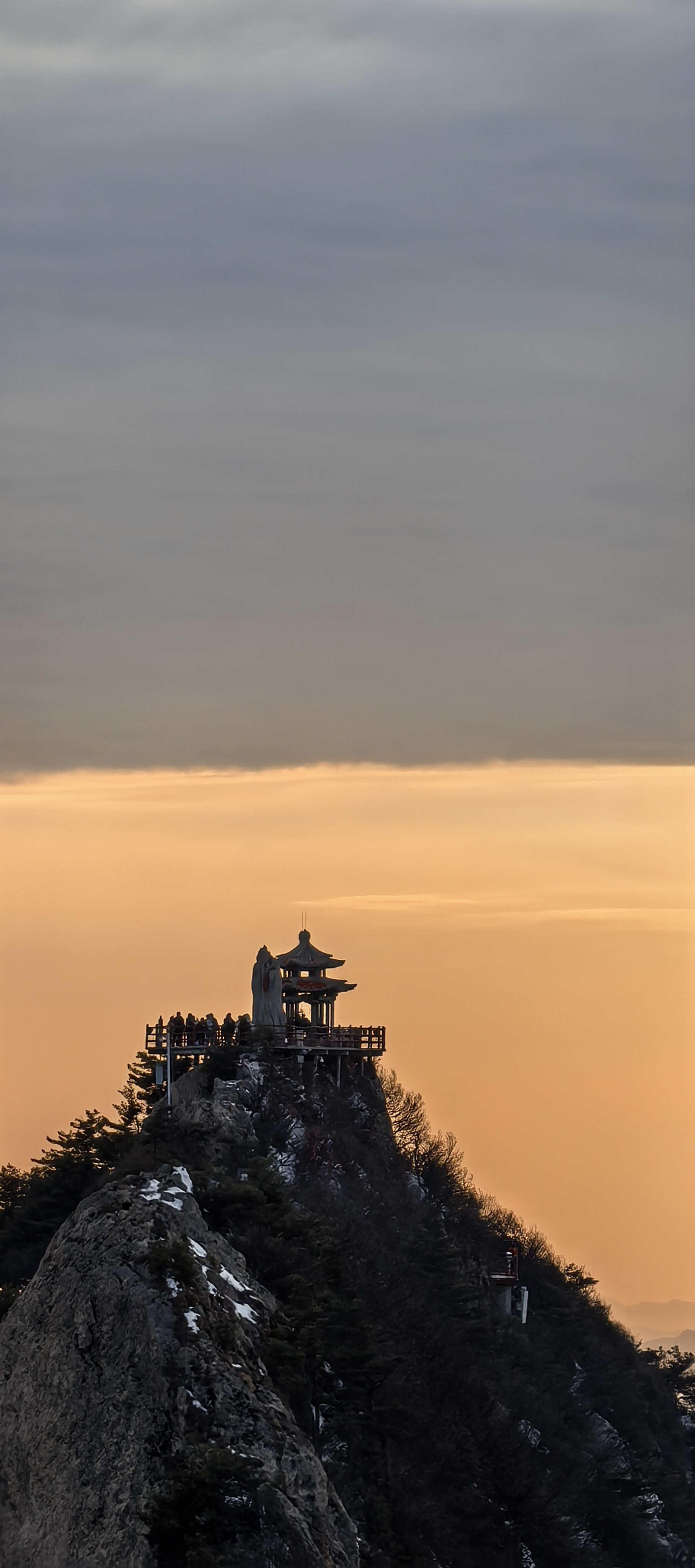 Gold roof in sky vertical